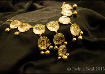 Gold necklace with clear jewelry